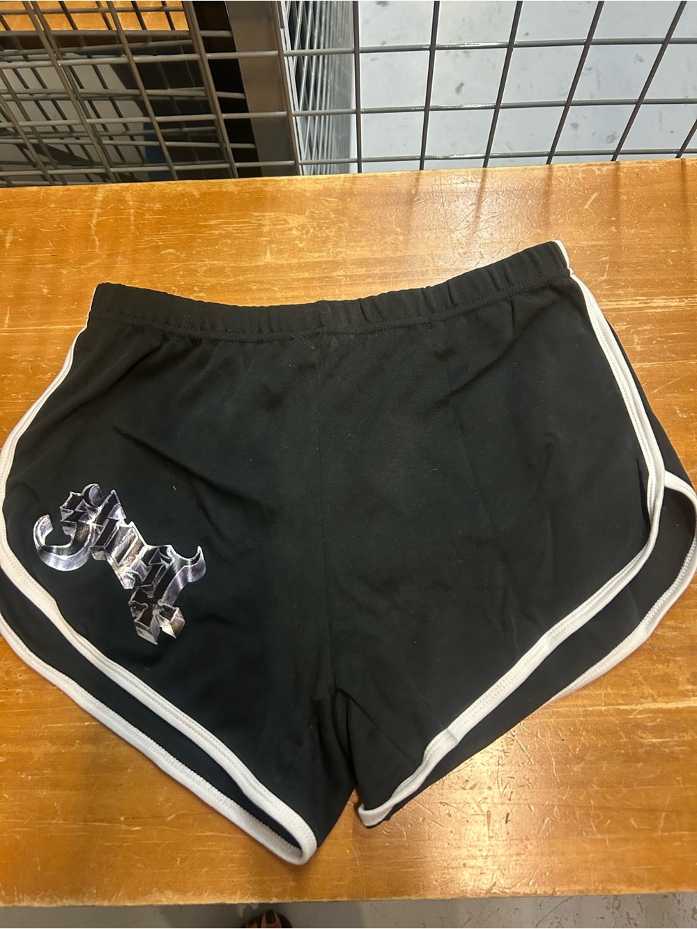 GHOST TOUR 2026 Black Women's Athletic Dolphin Shorts with White Trim L